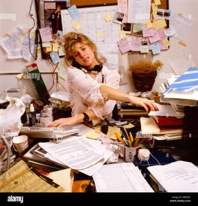 Office scene with visible disorganization or team confusion