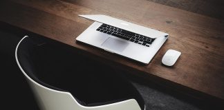 Kim Kardashian Shows Off Deep Cleavage In Plunging Top & Mini